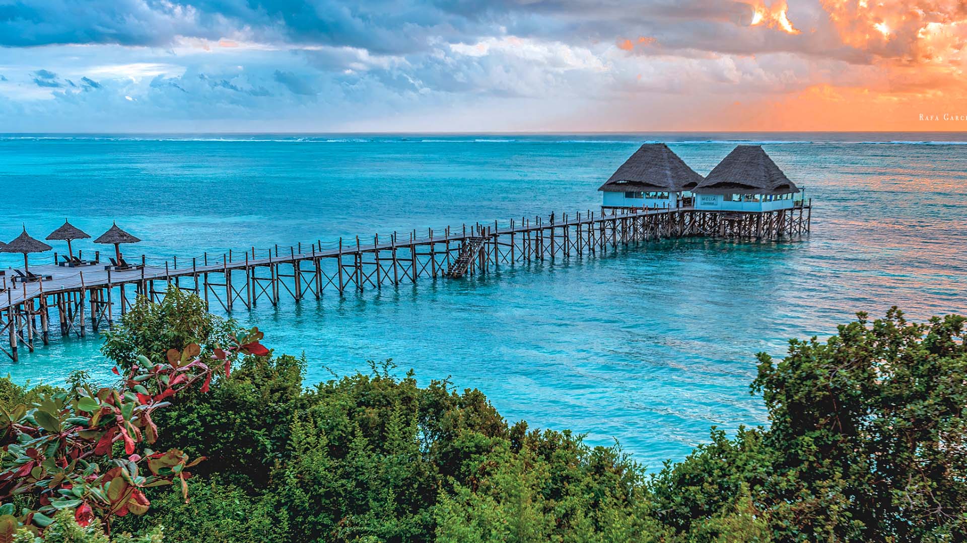 a building on a pier in the water_zanzibar